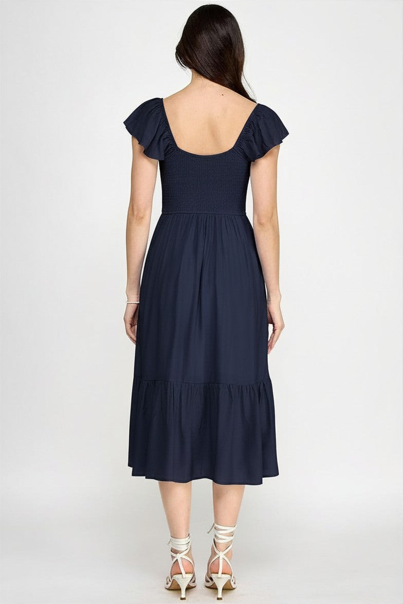Woman wearing a dress on a white background