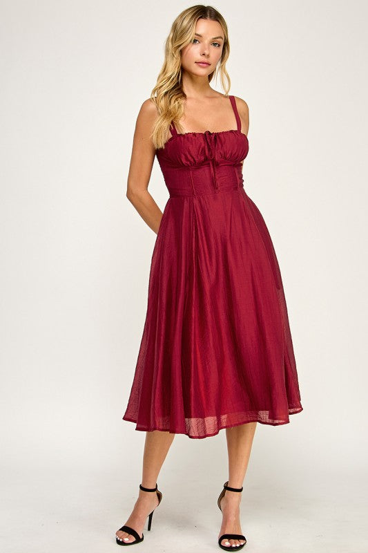 Woman wearing a dress on a white background