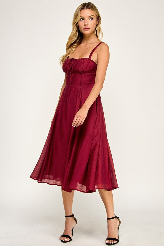 Woman wearing a dress on a white background