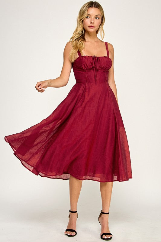 Woman wearing a dress on a white background
