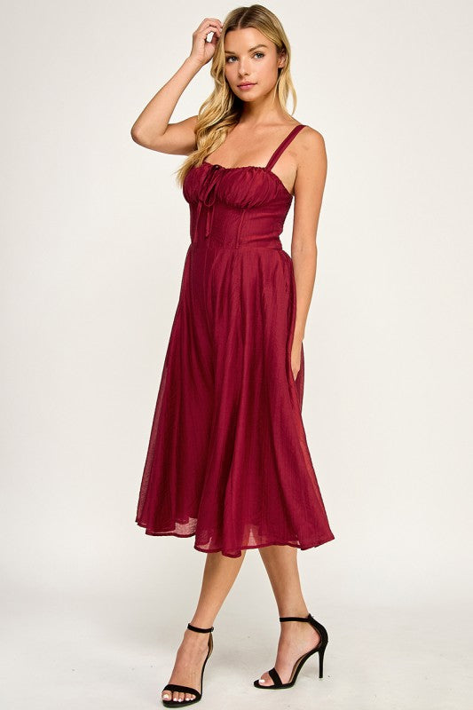 Woman wearing a dress on a white background