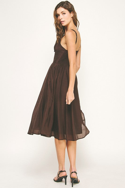 Woman wearing a dress on a white background