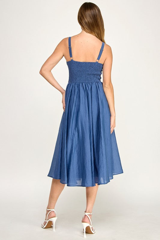 Woman wearing a dress on a white background