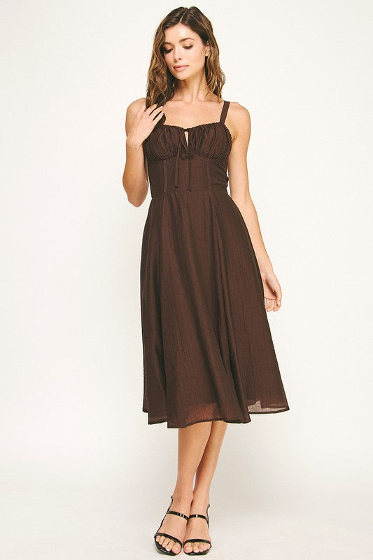 Woman wearing a dress on a white background
