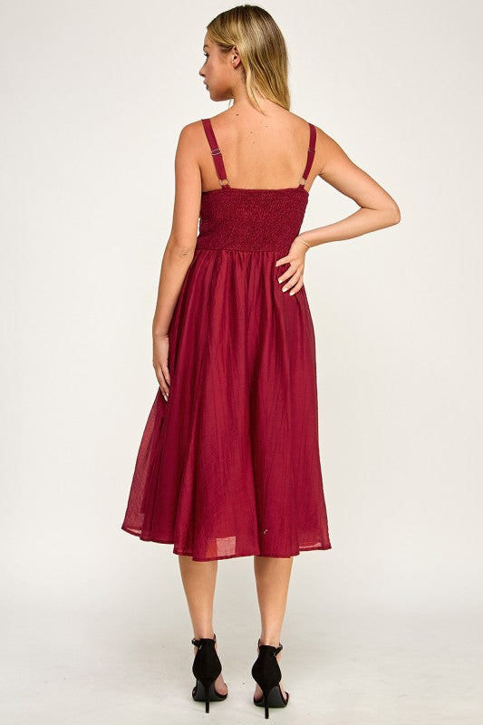 Woman wearing a dress on a white background