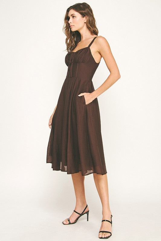 Woman wearing a dress on a white background