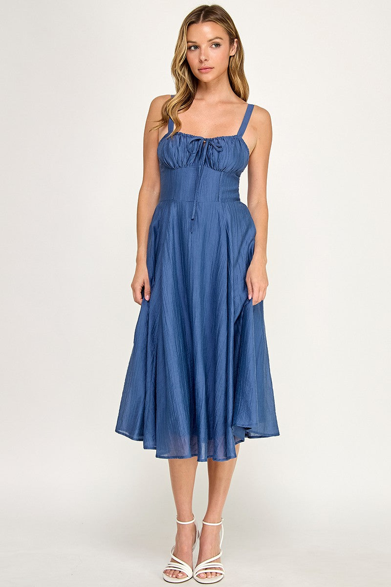 Woman wearing a dress on a white background