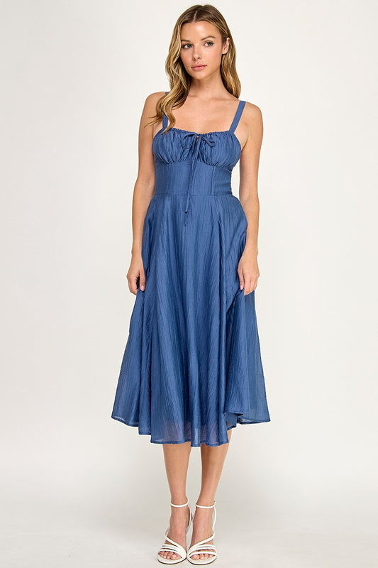 Woman wearing a dress on a white background