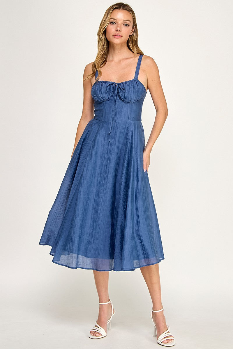 Woman wearing a dress on a white background