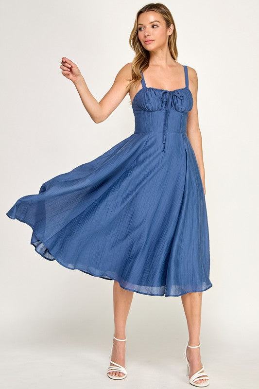 Woman wearing a dress on a white background