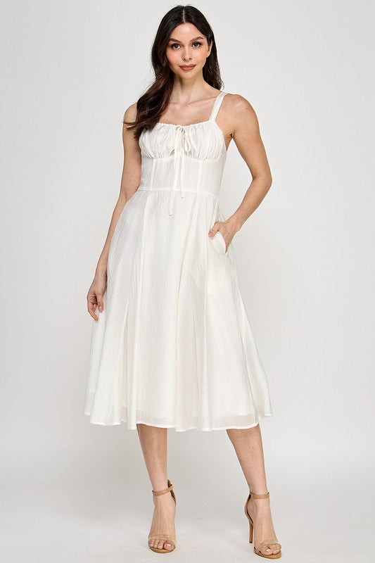 Woman wearing a dress on a white background