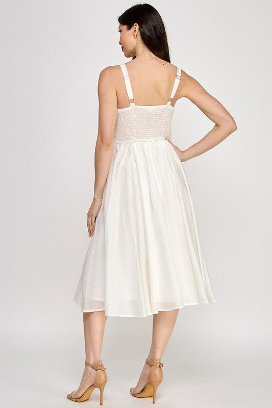 Woman wearing a dress on a white background