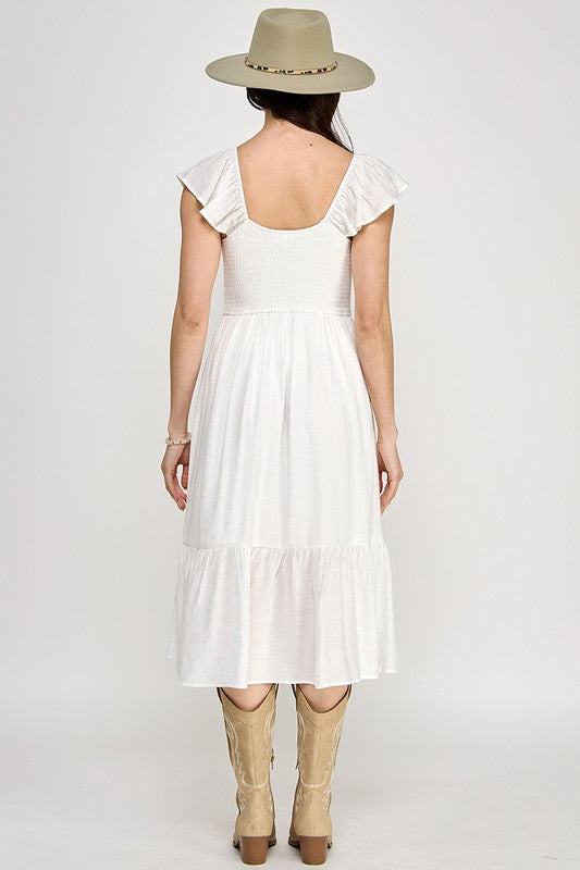 Woman wearing a dress on a white background