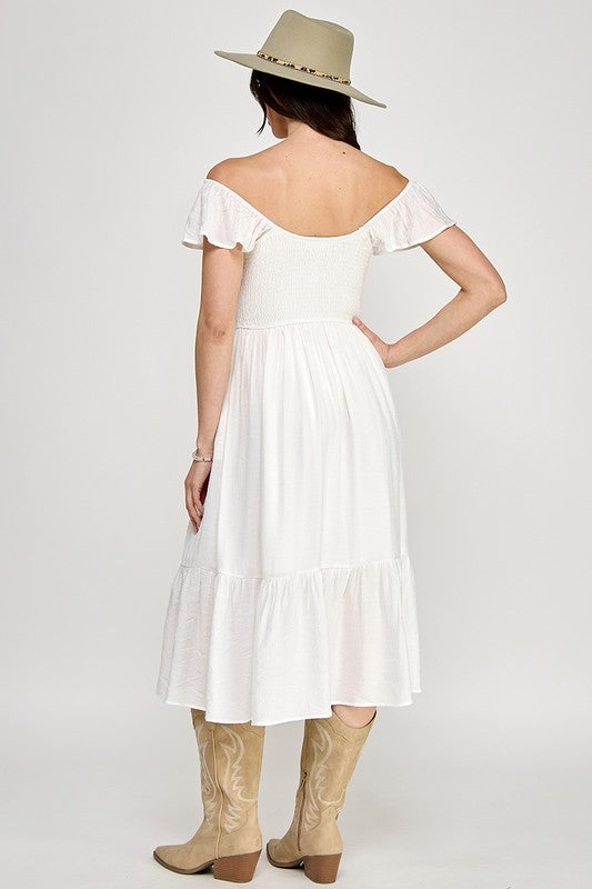 Woman wearing a dress on a white background