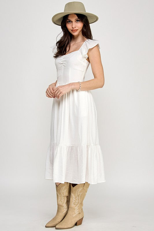 Woman wearing a dress on a white background