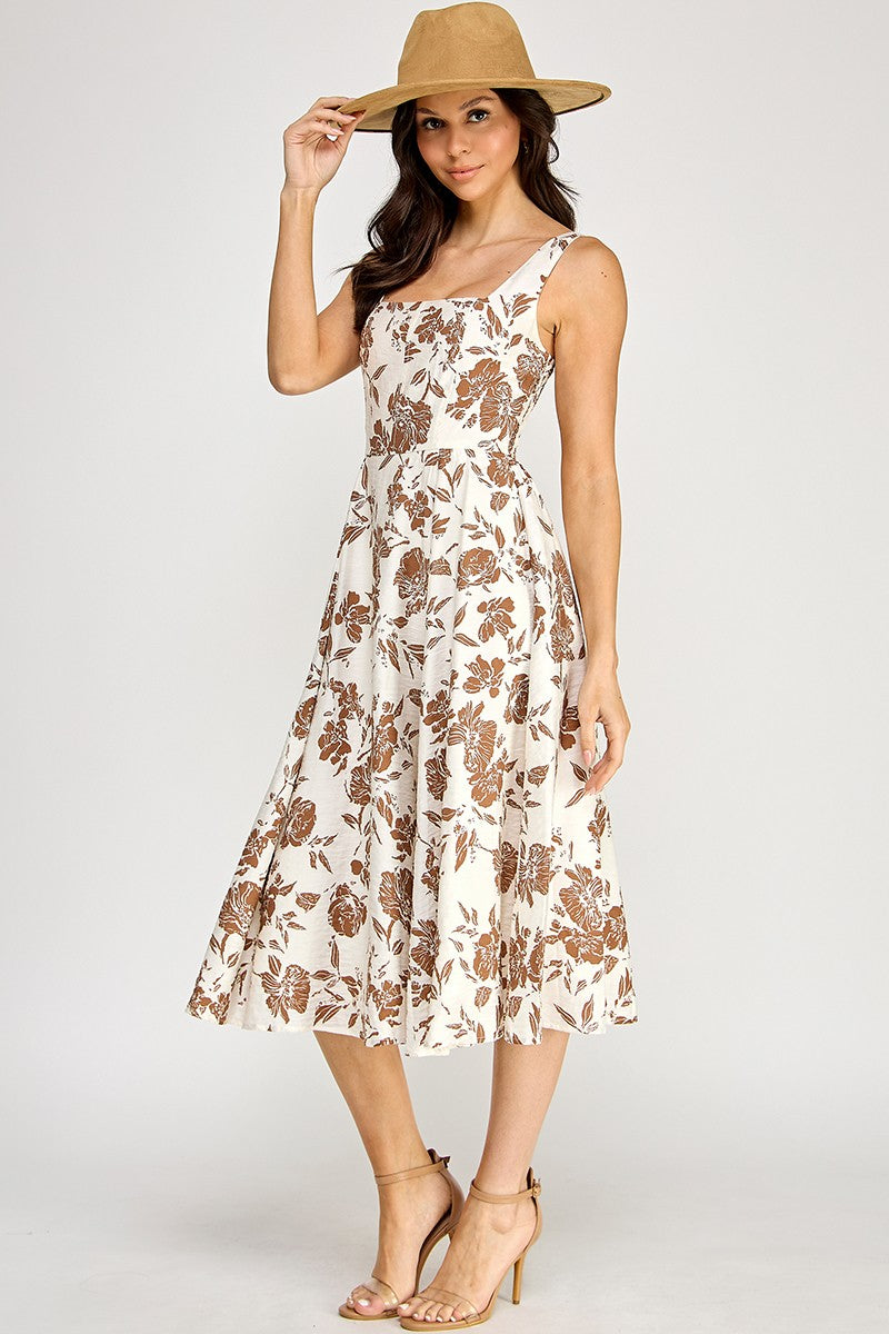Woman wearing a floral dress on a white background