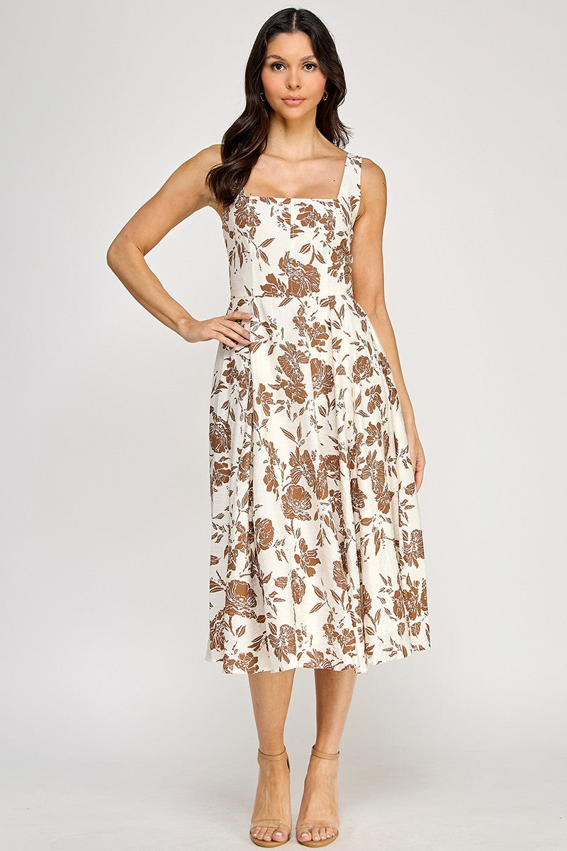 Woman wearing a floral dress on a white background