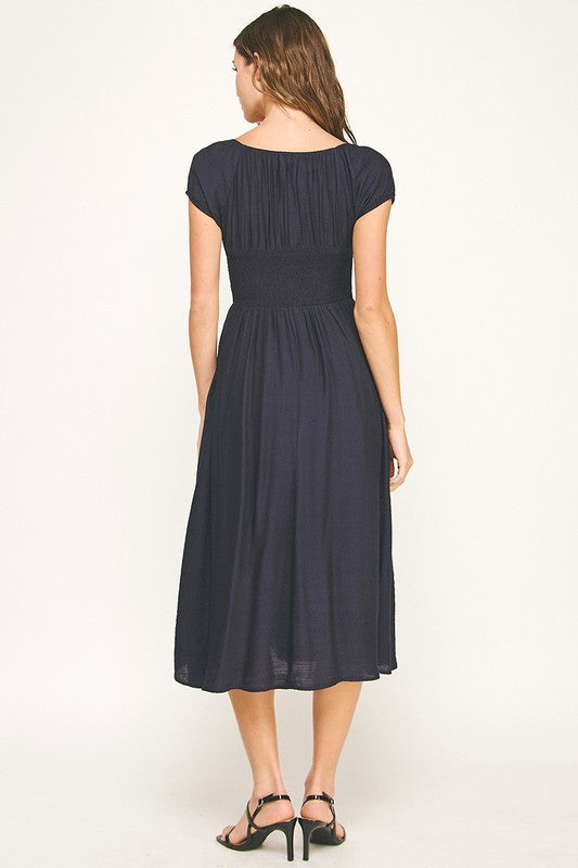 Woman wearing a dress on a white background