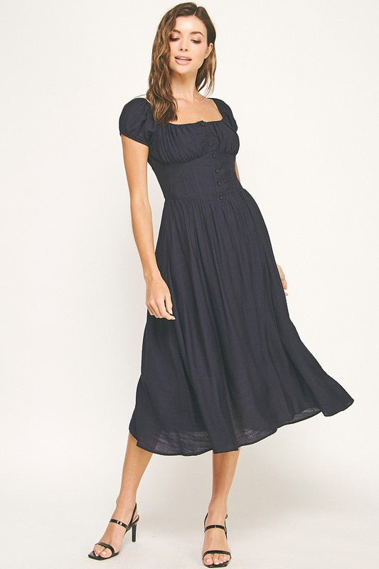 Woman wearing a dress on a white background