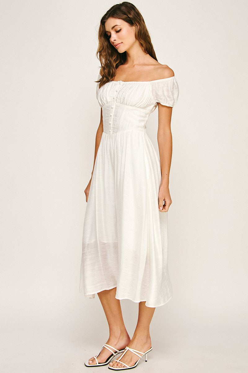 Woman wearing a dress on a white background