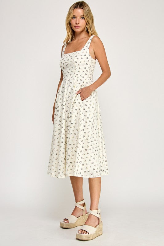 Woman wearing a floral dress on a white background