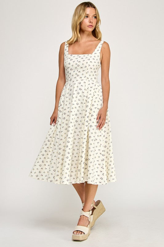 Woman wearing a floral dress on a white background