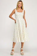 Woman wearing a floral dress on a white background