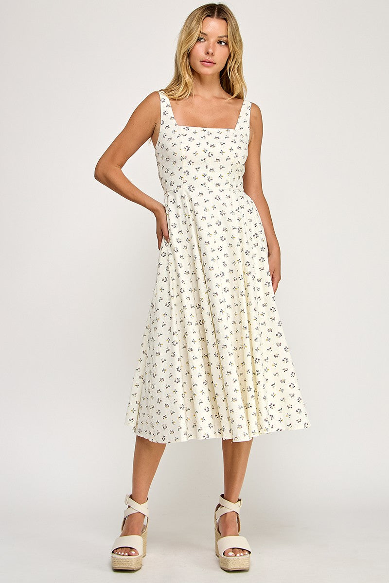 Woman wearing a floral dress on a white background