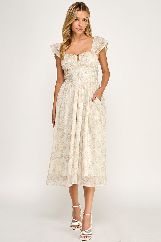 Woman wearing a floral dress on a white background