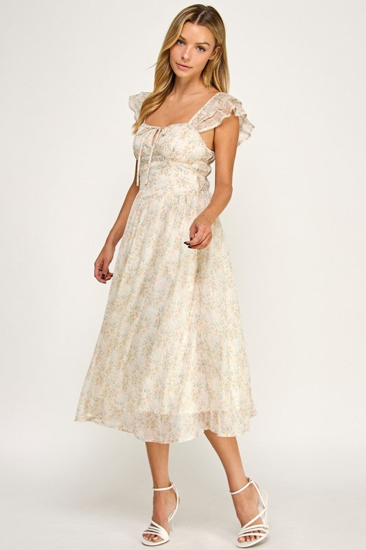 Woman wearing a floral dress on a white background