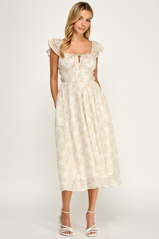 Woman wearing a floral dress on a white background