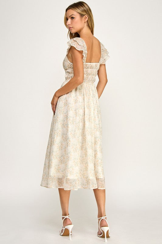Woman wearing a floral dress on a white background