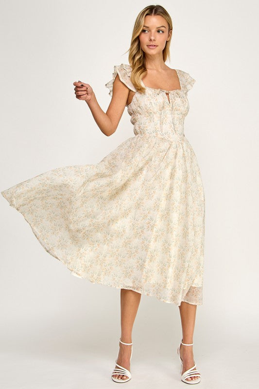 Woman wearing a floral dress on a white background