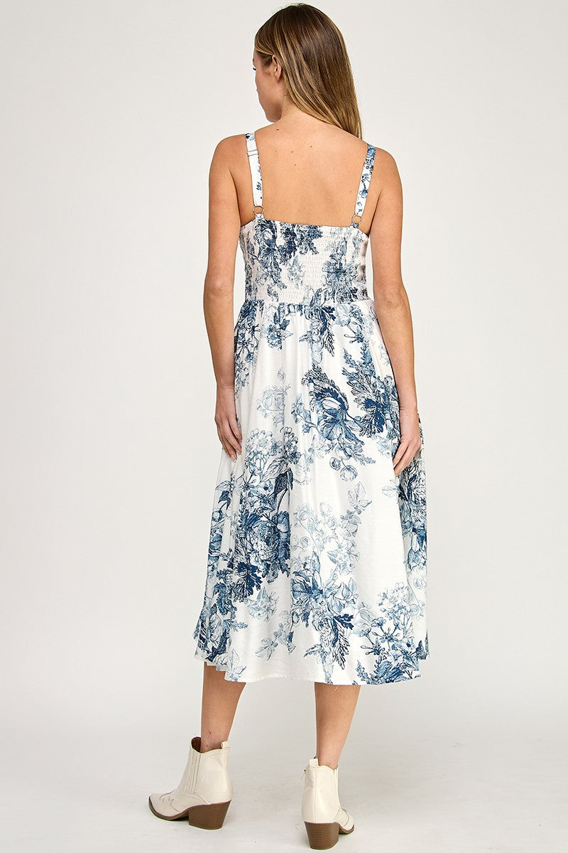 Woman wearing a floral dress on a white background