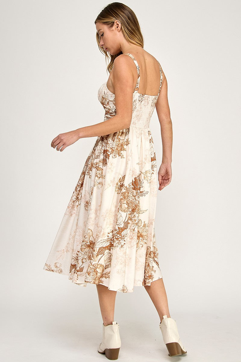 Woman wearing a floral dress on a white background