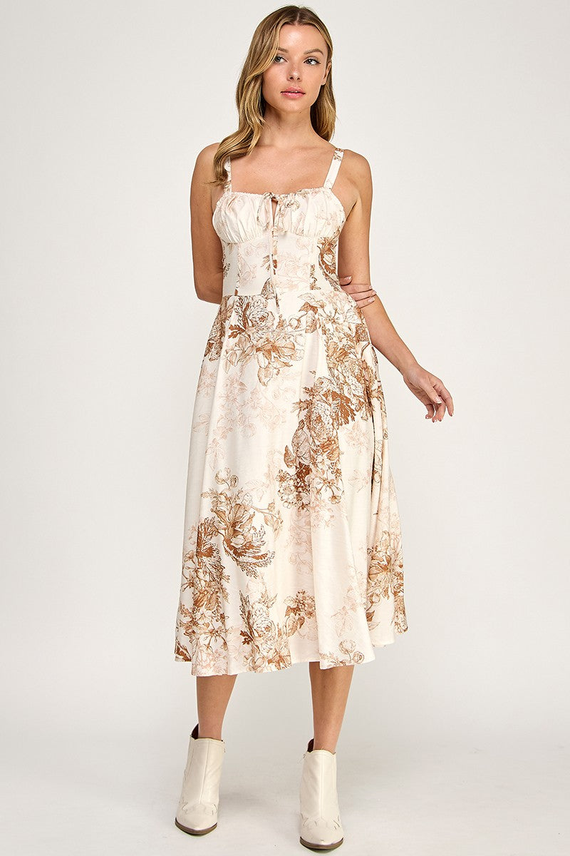 Woman wearing a floral dress on a white background