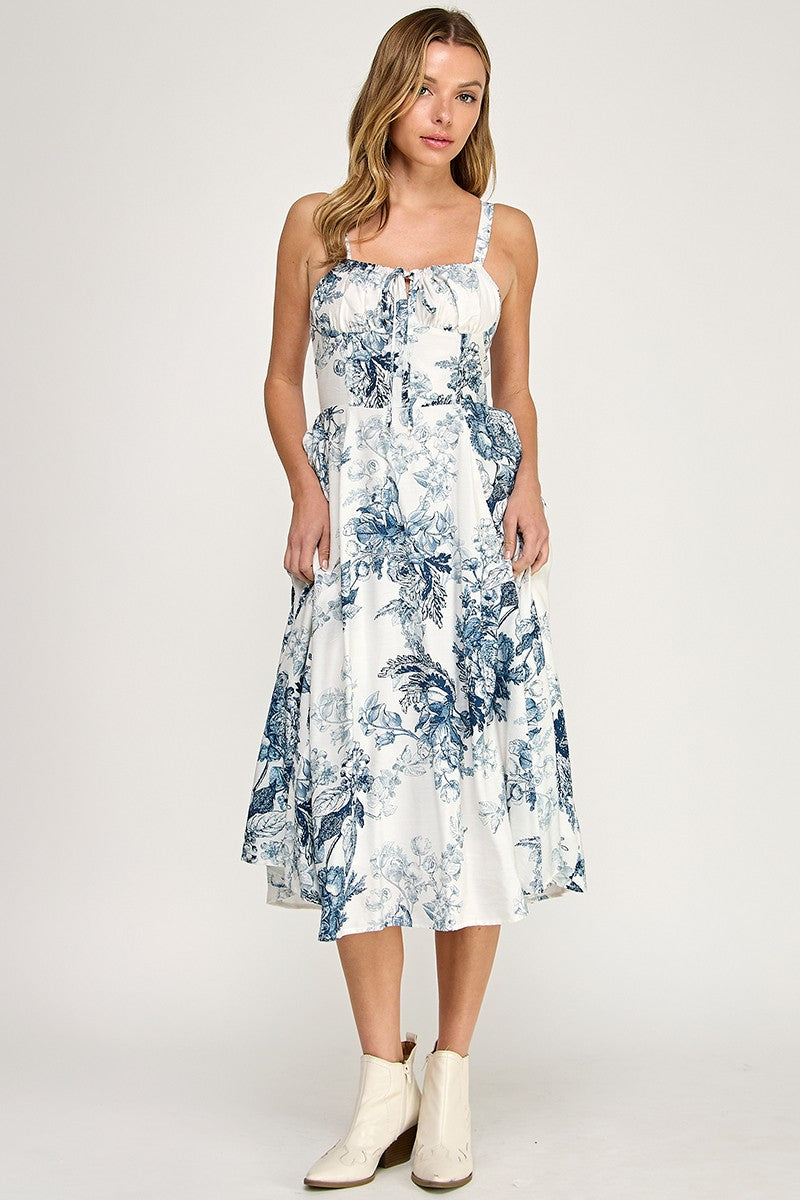 Woman wearing a floral dress on a white background