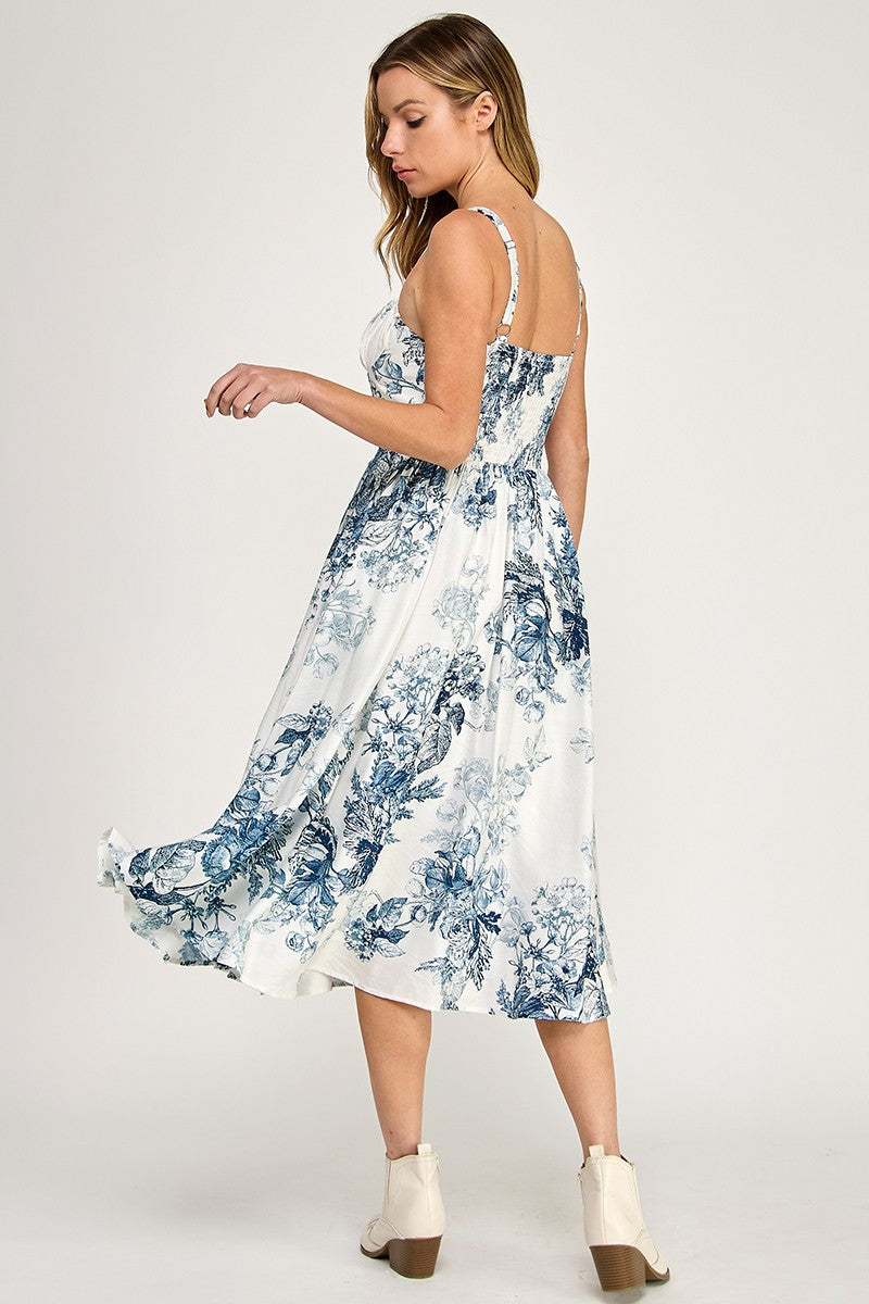 Woman wearing a floral dress on a white background