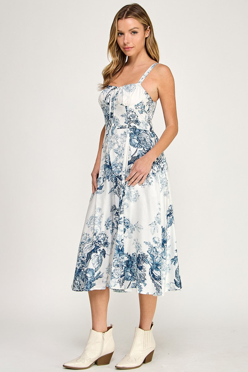 Woman wearing a floral dress on a white background