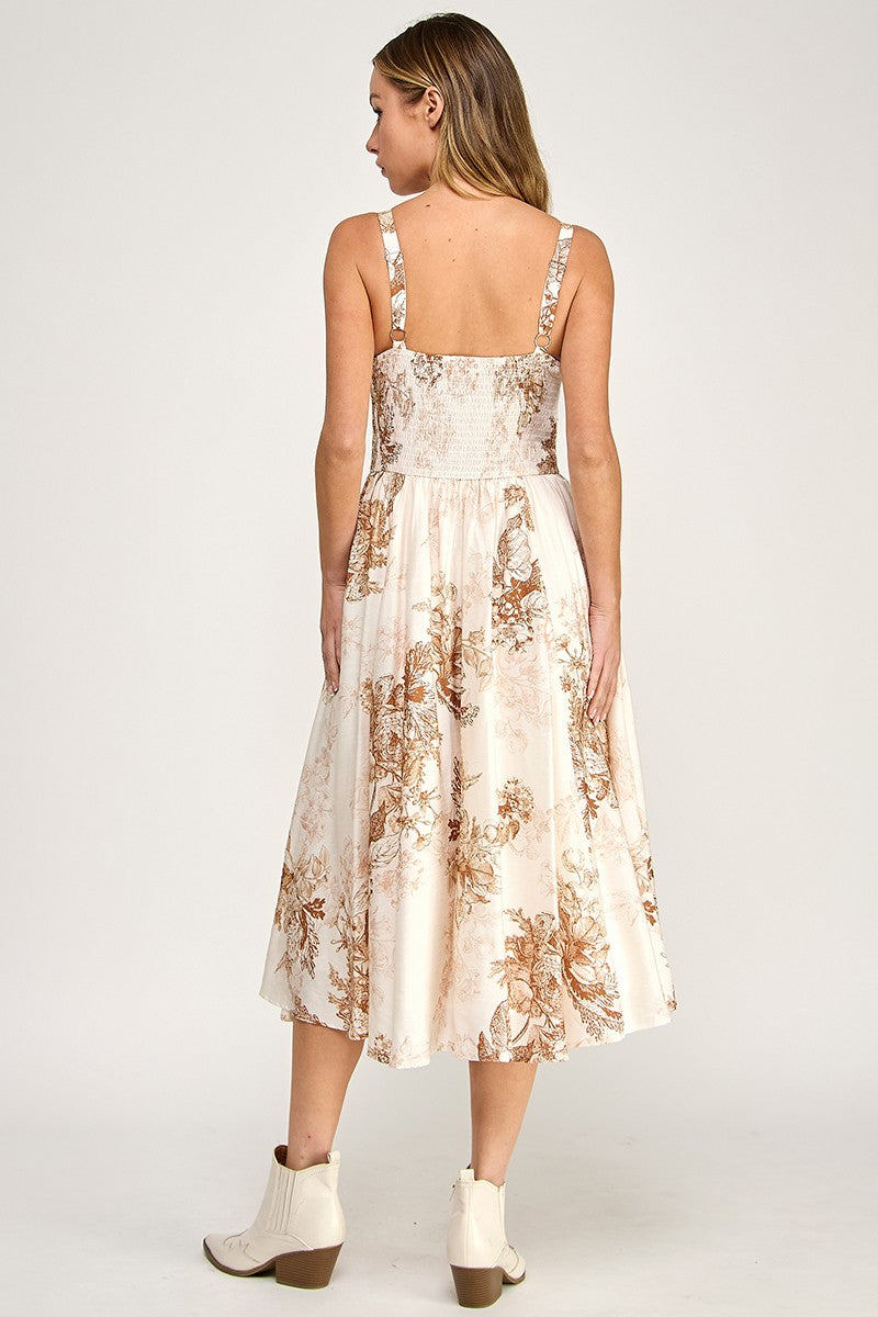Woman wearing a floral dress on a white background