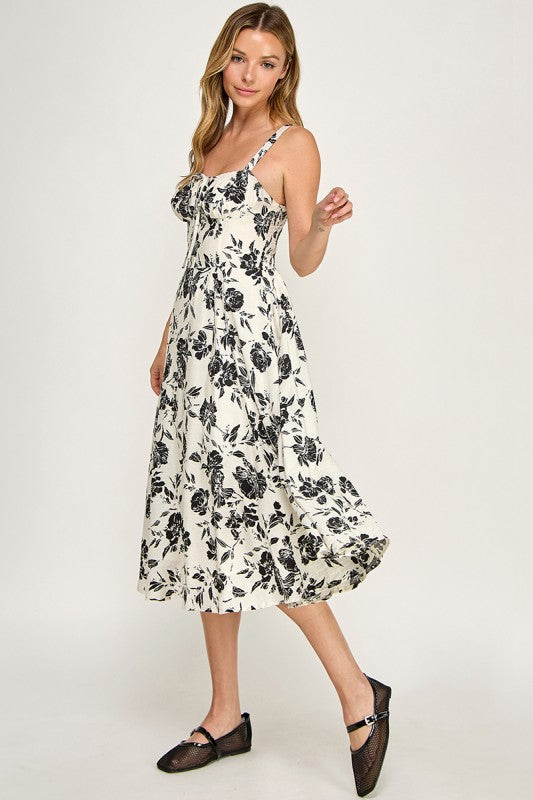 Woman wearing a floral dress on a white background