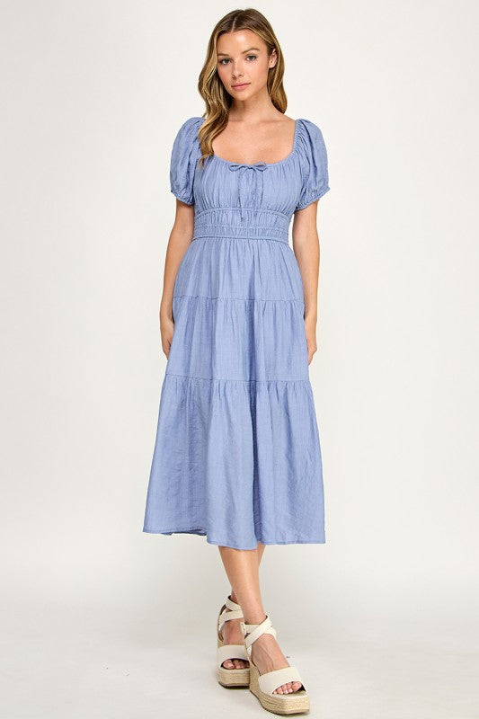 Woman wearing a dress on a white background