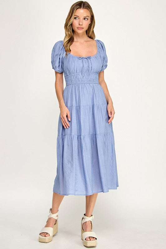 Woman wearing a dress on a white background