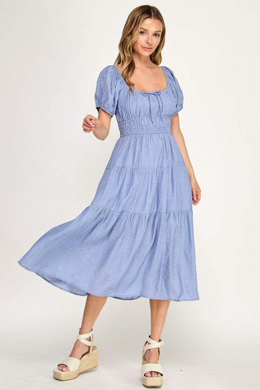 Woman wearing a dress on a white background
