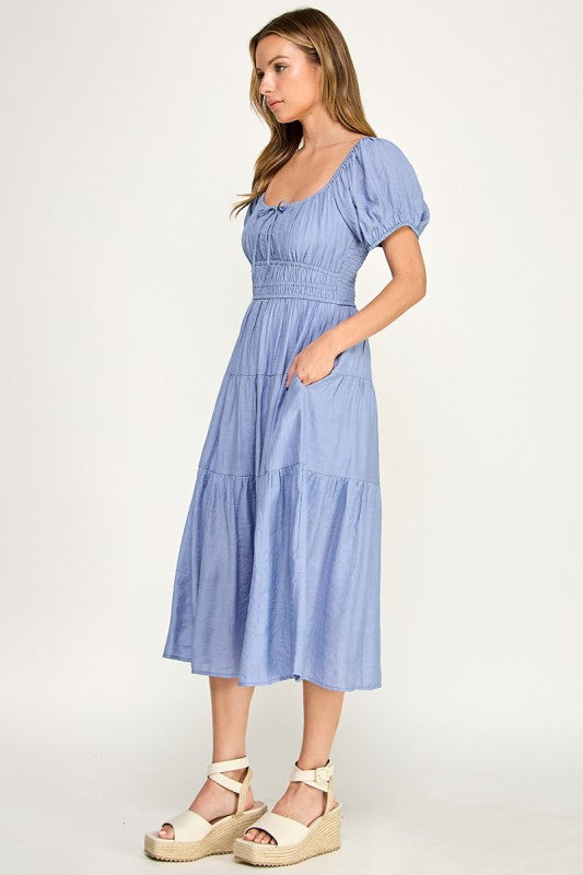 Woman wearing a dress on a white background