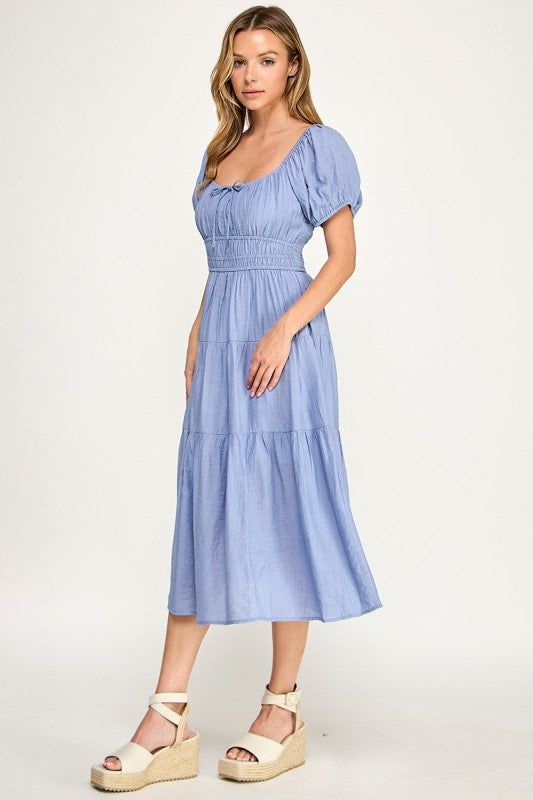 Woman wearing a dress on a white background