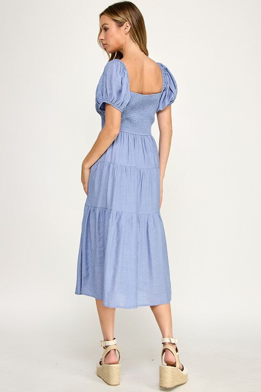 Woman wearing a dress on a white background