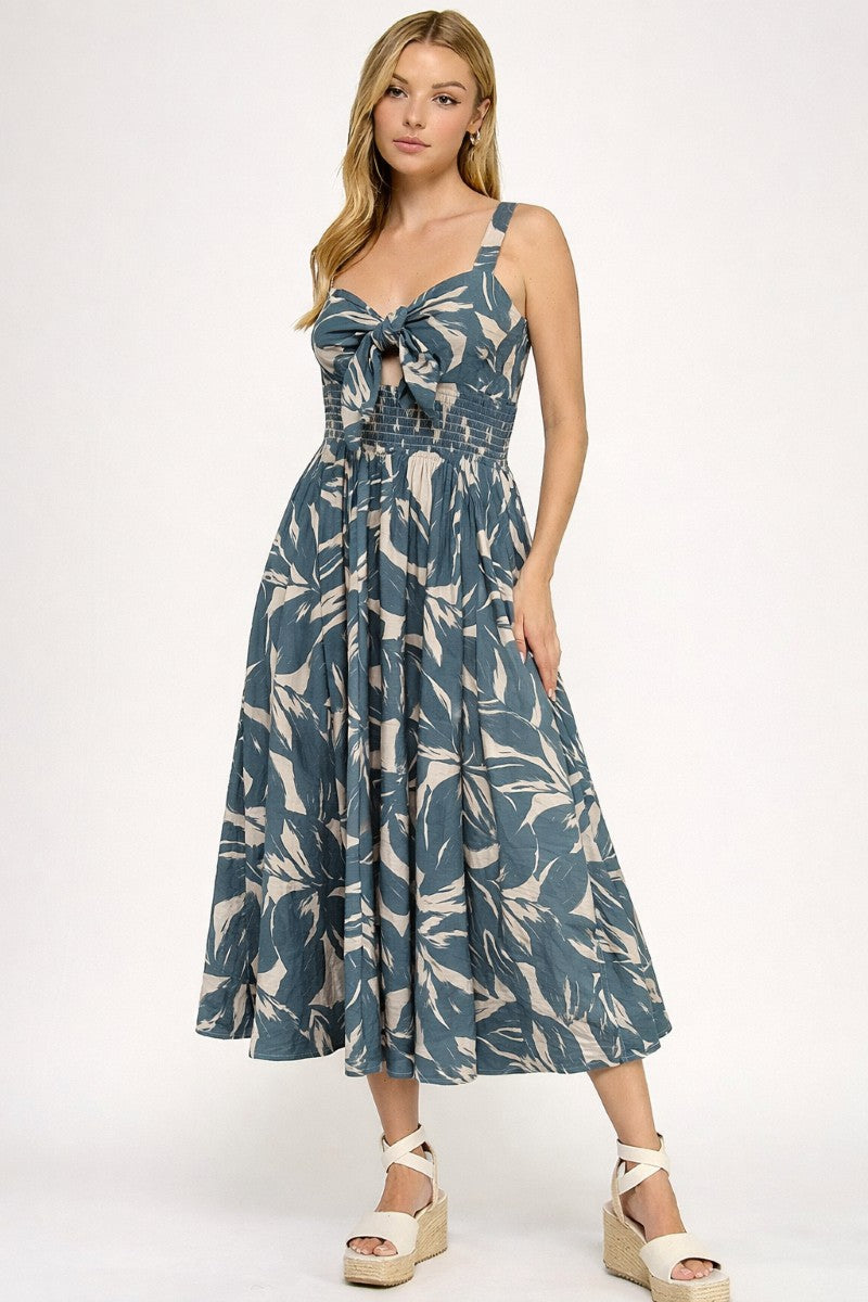 Woman wearing a floral dress on a white background