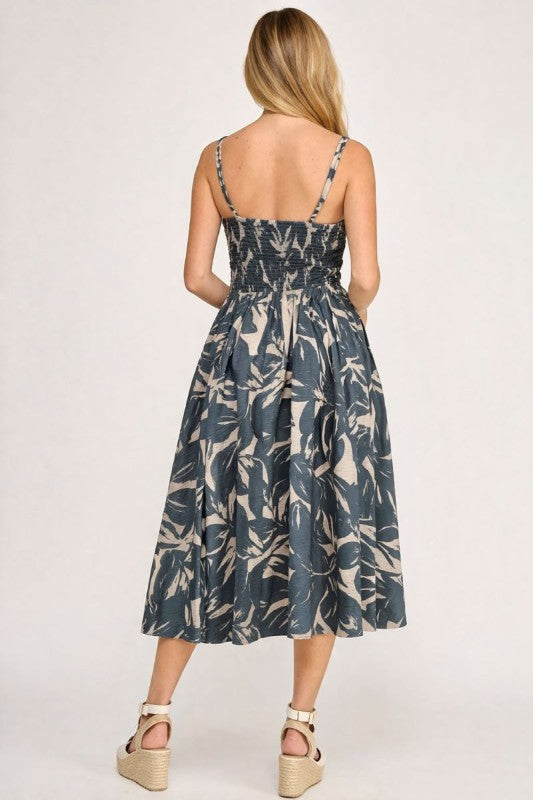 Woman wearing a floral dress on a white background