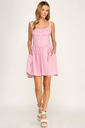Woman wearing a dress on a white background
